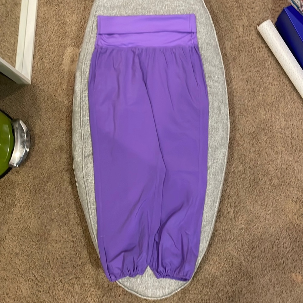 Lululemon high waisted or turn down at top.  Size 6. Purple.  Worn once.